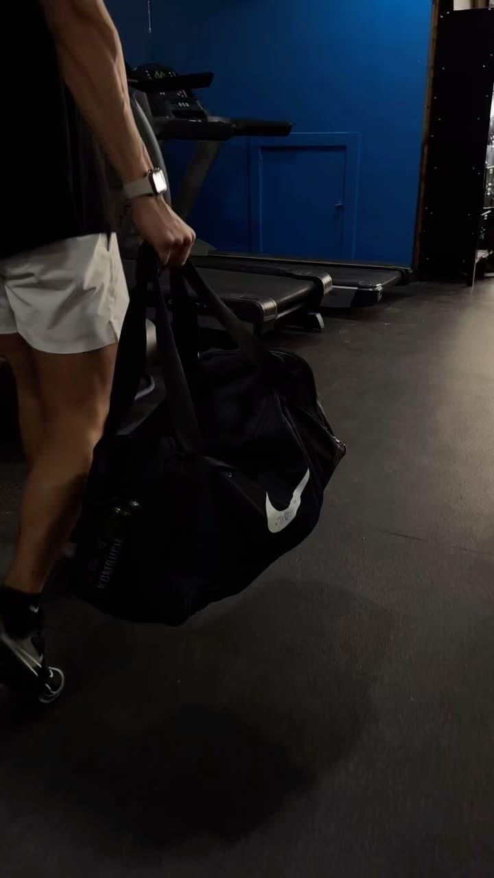 Member heading past the treadmills after a session